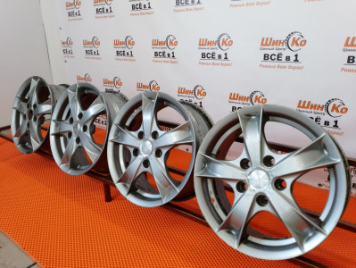 Диск литой б/у MAZDA R15